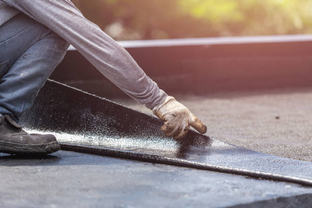 Professional Exterior Waterproofing technician working in Madison Heights, MI
